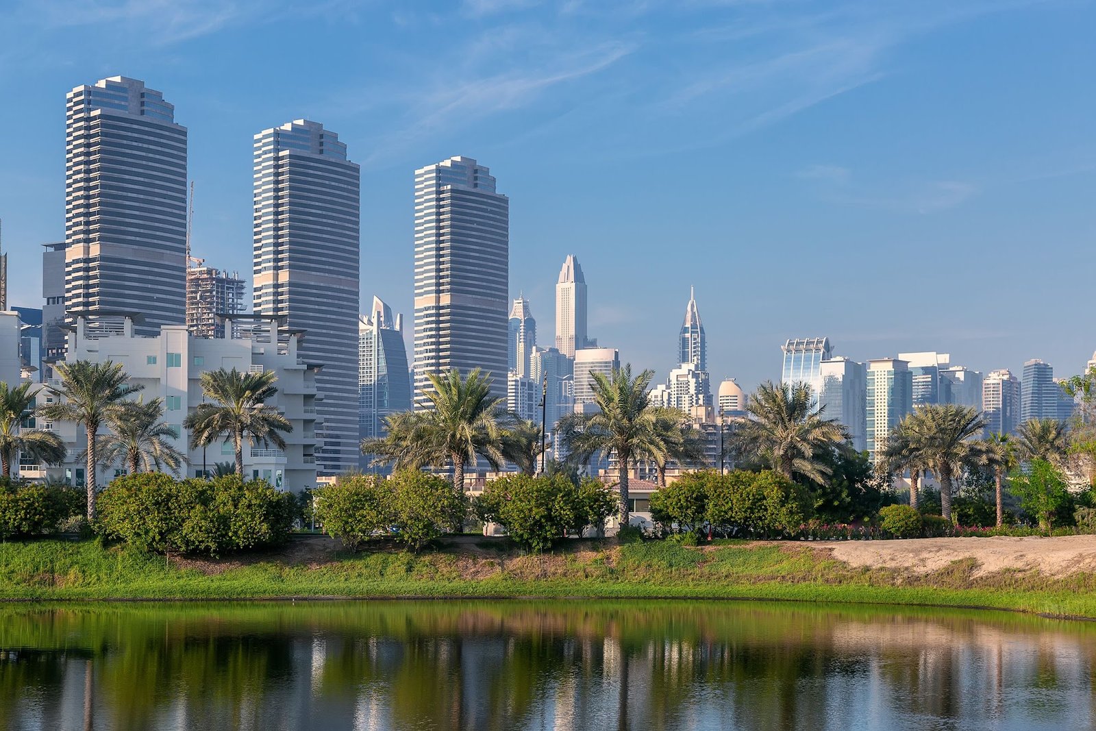 Dubai residential towers beside parkland